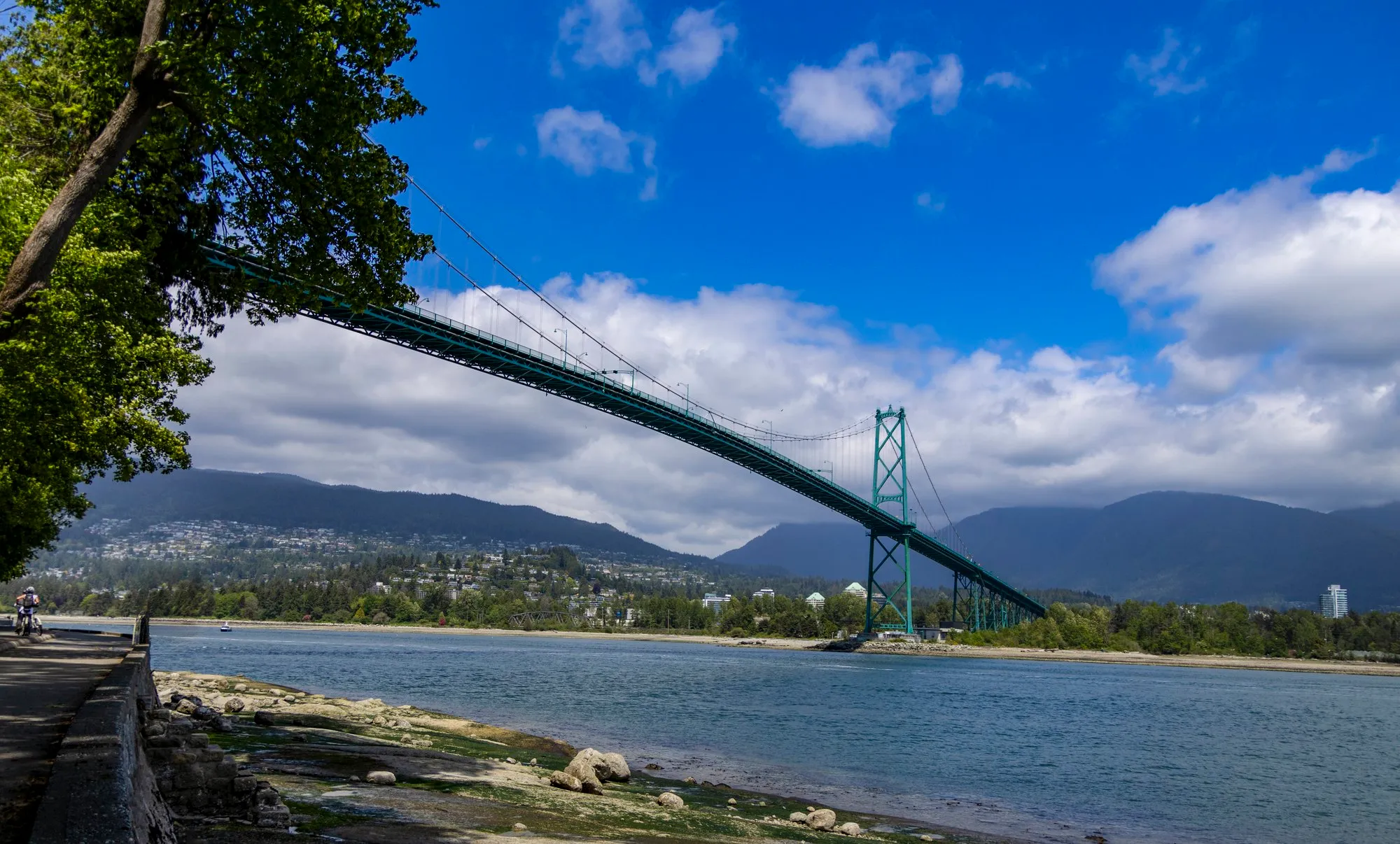 Lions Gate Bridge from the seawall below Prospect Point, the North Shore mountains behind it