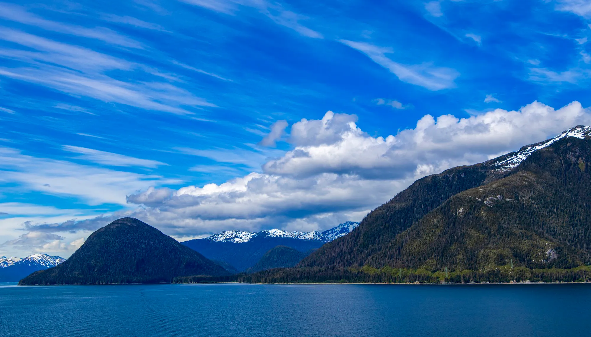 Stephens Passage in the afternoon, streaked cloud over the water