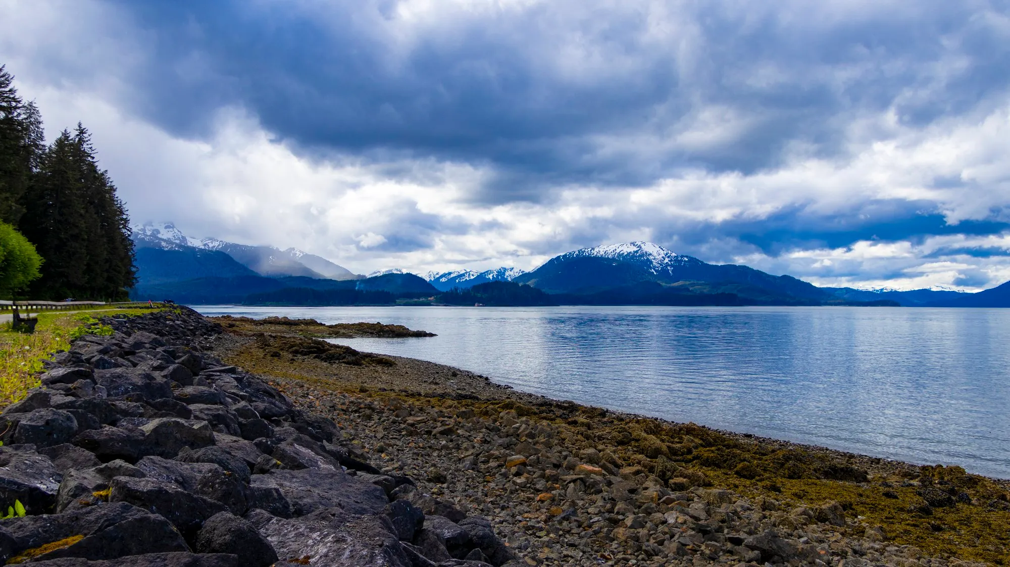 The beach and the shore road toward Hoonah, snow on the ridge across the water